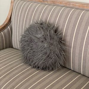 Small gray throw pillow